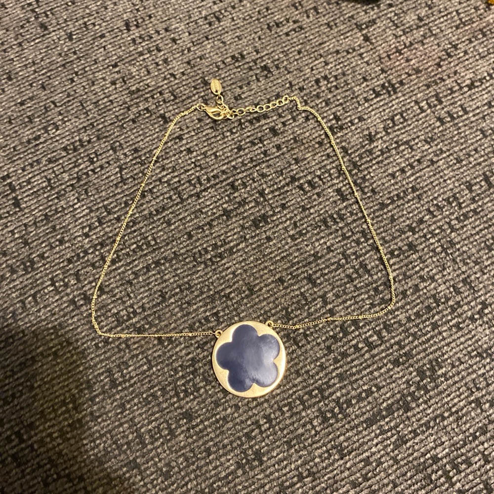 Marlyn Schiff gold necklace with navy flower